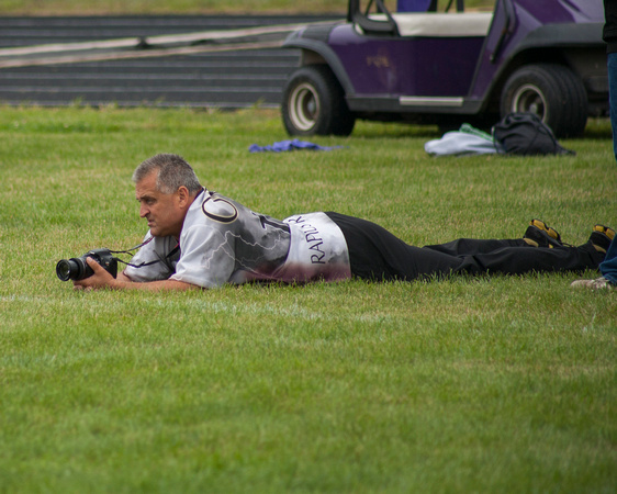 2976 Assistant Photographer laying down on the job